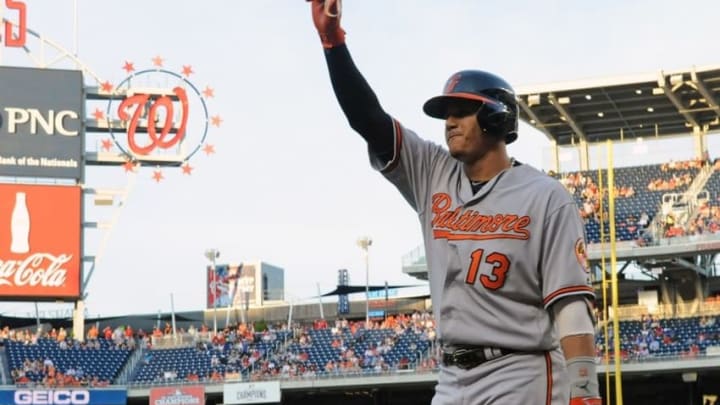 Aug 24, 2016; Washington, DC, USA; Baltimore Orioles third baseman Manny Machado (13) reacts after hitting a two run home run during the first inning against the Washington Nationals at Nationals Park. Mandatory Credit: Brad Mills-USA TODAY Sports