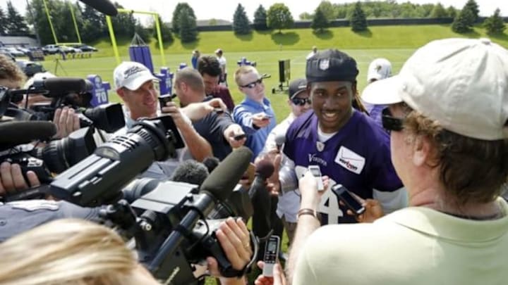 Jun 17, 2014; Eden Prairie, MN, USA; Minnesota Vikings wide receiver Cordarrelle Patterson (84) speaks with the media after practice at Winter Park. Mandatory Credit: Bruce Kluckhohn-USA TODAY Sports