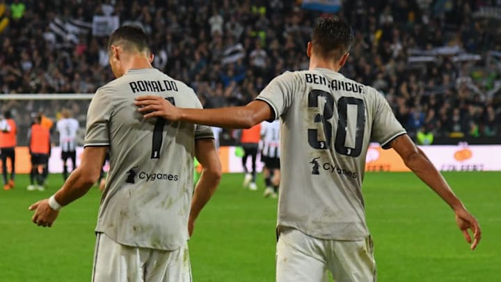 UDINE, ITALY - OCTOBER 06: Cristiano Ronaldo and Rodrigo Bentancur of Juventus celebrate the victory afte the Serie A match between Udinese and Juventus at Stadio Friuli on October 6, 2018 in Udine, Italy. (Photo by Alessandro Sabattini/Getty Images)