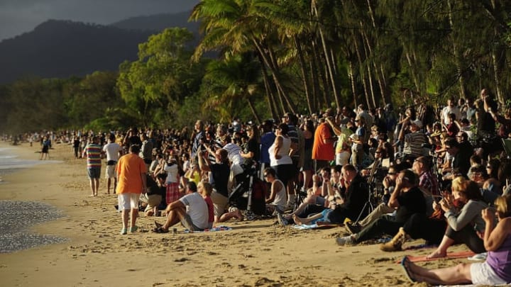 Spectators gather in Palm Cove, Australia