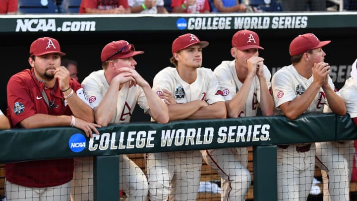 Arkansas Razorbacks look on from the dugout as they loose to the Oregon State Beavers.