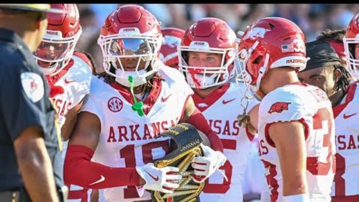 Hogs' defensive back TJ Metcalf, offensive lineman Fernando Carmona