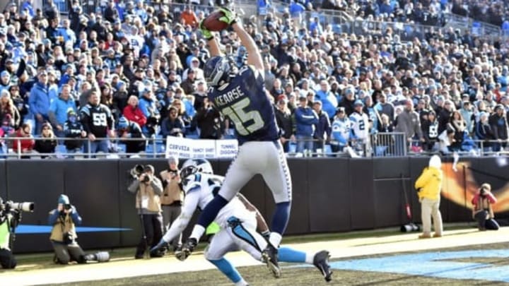 Jan 17, 2016; Charlotte, NC, USA; Seattle Seahawks wide receiver Jermaine Kearse (15) catches a 19 yard touchdown pass defended by Carolina Panthers defensive back Robert McClain (27) in the third quarter during the NFC Divisional round playoff game at Bank of America Stadium. Mandatory Credit: Bob Donnan-USA TODAY Sports