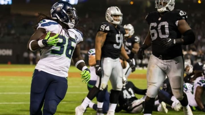 Sep 1, 2016; Oakland, CA, USA; Seattle Seahawks running back Alex Collins (36) scores a touchdown against the Oakland Raiders during the fourth quarter at Oakland Coliseum. The Seattle Seahawks defeated the Oakland Raiders 23-21. Mandatory Credit: Kelley L Cox-USA TODAY Sports