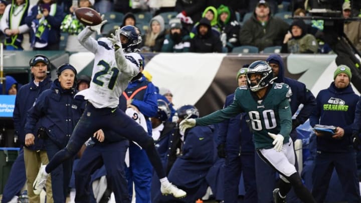 PHILADELPHIA, PA - NOVEMBER 24: Tre Flowers #21 of the Seattle Seahawks heals in an interception on a pass intended for Jordan Matthews #80 of the Philadelphia Eagles during the fourth quarter at Lincoln Financial Field on November 24, 2019 in Philadelphia, Pennsylvania. The Seahawks defeated the Eagles 17-9. (Photo by Corey Perrine/Getty Images)