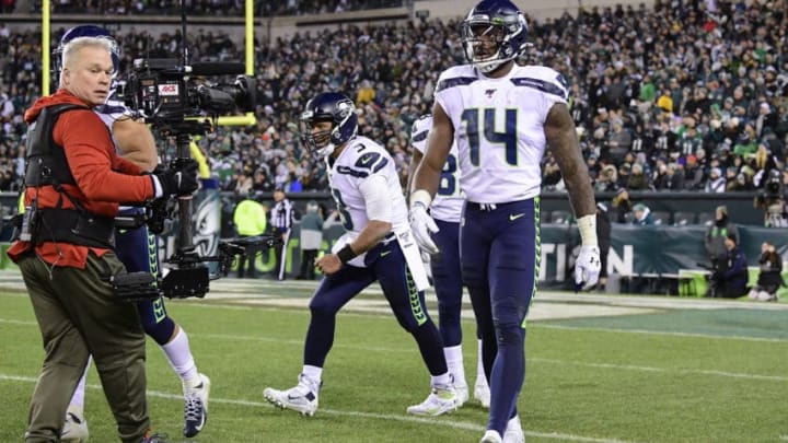 PHILADELPHIA, PENNSYLVANIA - JANUARY 05: DK Metcalf #14 of the Seattle Seahawks reacts after his touchdown reception against the Philadelphia Eagles in the NFC Wild Card Playoff game at Lincoln Financial Field on January 05, 2020 in Philadelphia, Pennsylvania. (Photo by Steven Ryan/Getty Images)