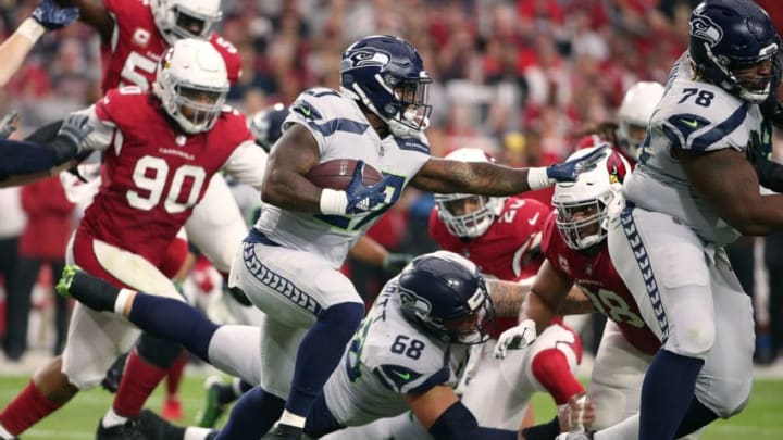 GLENDALE, AZ - SEPTEMBER 30: Running back Mike Davis #27 of the Seattle Seahawks runs with the ball against the Arizona Cardinals during an NFL game at State Farm Stadium on September 30, 2018 in Glendale, Arizona. (Photo by Ralph Freso/Getty Images)