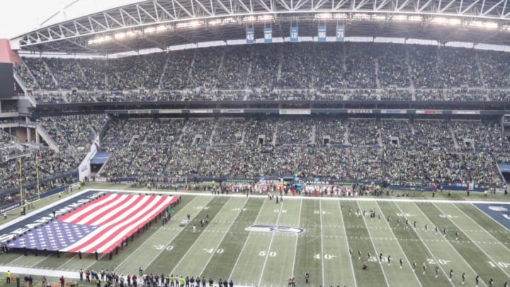 SEATTLE, WA - DECEMBER 30: The American flag is displayed on the field for the national anthem before the game between the Seattle Seahawks and the Arizona Cardinals at CenturyLink Field on December 30, 2018 in Seattle, Washington. (Photo by Abbie Parr/Getty Images)