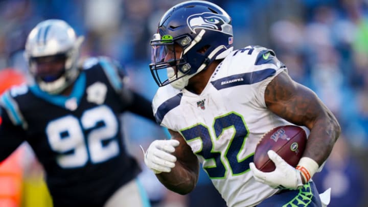 CHARLOTTE, NORTH CAROLINA - DECEMBER 15: Chris Carson #32 of the Seattle Seahawks during the second half during their game against the Carolina Panthers at Bank of America Stadium on December 15, 2019 in Charlotte, North Carolina. (Photo by Jacob Kupferman/Getty Images)