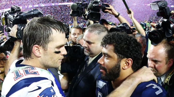 GLENDALE, AZ - FEBRUARY 01: Tom Brady #12 of the New England Patriots is congratulated by Russell Wilson #3 of the Seattle Seahawks after Super Bowl XLIX at University of Phoenix Stadium on February 1, 2015 in Glendale, Arizona. The Patriots defeated the Seahawks 28-24. (Photo by Tom Pennington/Getty Images)