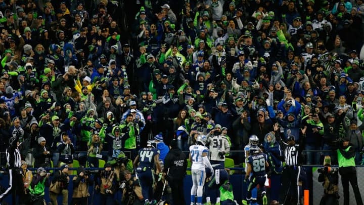 SEATTLE, WA - JANUARY 07: Seattle Seahawks fans cheer after Paul Richardson SEATTLE, WA - JANUARY 07: Seattle Seahawks fans cheer after Paul Richardson