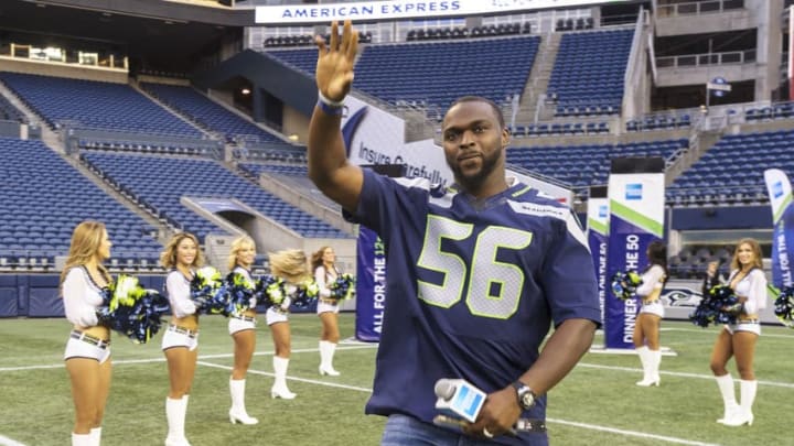 SEATTLE, WA - AUGUST 29: Seattle Seahawks star Cliff Avril waves to the crowd as he enters CenturyLink Field during the American Express "Dinner on the 50"on August 29, 2017 in Seattle, Washington. (Photo by Paul Conrad/Getty Images for American Express)