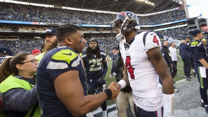 Oct 29, 2017; Seattle, WA, USA; Seattle Seahawks quarterback Russell Wilson (3) embraces Houston Texans quarterback Deshaun Watson (4) after a game at CenturyLink Field. The Seahawks won 41-38. Mandatory Credit: Troy Wayrynen-USA TODAY Sports