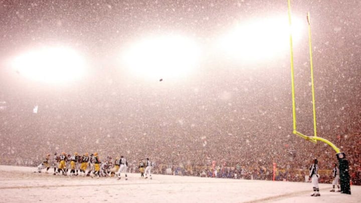 Seattle kicks a field goal in the third quarter while the heaviest snow fell at Lambeau. The Green Bay Packers defeated the Seattle Seahawks 42-20 in the divisional playoff game at Lambeau Field in Green Bay, WI Saturday January 12, 2007.Packers13 Spt Lynn 12