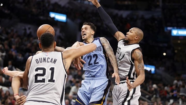 Mar 25, 2016; San Antonio, TX, USA; Memphis Grizzlies small forward Matt Barnes (22) shoots the ball as San Antonio Spurs power forward Tim Duncan (21) and David West (30, right) defend during the second half at AT&T Center. Mandatory Credit: Soobum Im-USA TODAY Sports Mar 25, 2016; San Antonio, TX, USA; Memphis Grizzlies small forward Matt Barnes (22) shoots the ball as San Antonio Spurs power forward Tim Duncan (21) and David West (30, right) defend during the second half at AT&T Center. Mandatory Credit: Soobum Im-USA TODAY Sports