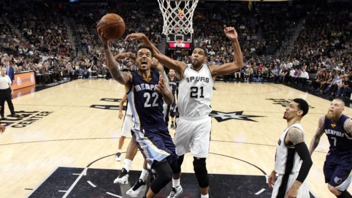 Apr 19, 2016; San Antonio, TX, USA; Memphis Grizzlies small forward Matt Barnes (22) shoots the ball past San Antonio Spurs power forward Tim Duncan (21) in game two of the first round of the NBA Playoffs at AT&T Center. Mandatory Credit: Soobum Im-USA TODAY Sports