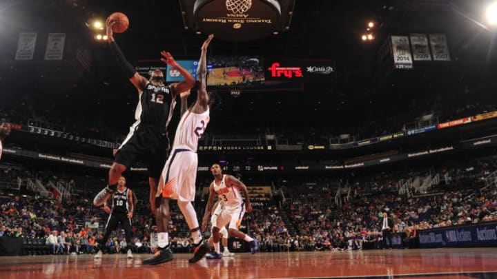 PHOENIX, AZ - OCTOBER 31: LaMarcus Aldridge #12 of the San Antonio Spurs shoots the ball against the Phoenix Suns on October 31, 2018 at Talking Stick Resort Arena in Phoenix, Arizona. NOTE TO USER: User expressly acknowledges and agrees that, by downloading and/or using this Photograph, user is consenting to the terms and conditions of the Getty Images License Agreement. Mandatory Copyright Notice: Copyright 2018 NBAE (Photo by Barry Gossage/NBAE via Getty Images)