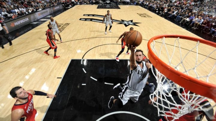 SAN ANTONIO, TX - NOVEMBER 3: Marco Belinelli #18 of the San Antonio Spurs shoots the ball against the New Orleans Pelicans (Photos by Mark Sobhani/NBAE via Getty Images)