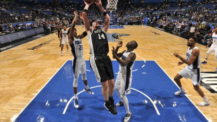 ORLANDO, FL - DECEMBER 19: Drew Eubanks #14 of the San Antonio Spurs shoots the ball against the Orlando Magic on December 19, 2018 at Amway Center in Orlando, Florida. NOTE TO USER: User expressly acknowledges and agrees that, by downloading and or using this photograph, User is consenting to the terms and conditions of the Getty Images License Agreement. Mandatory Copyright Notice: Copyright 2018 NBAE (Photo by Fernando Medina/NBAE via Getty Images)