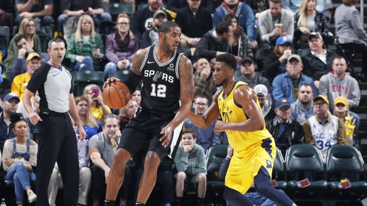 INDIANAPOLIS, IN – NOVEMBER 23: LaMarcus Aldridge #12 of the San Antonio Spurs looks to the basket against Thaddeus Young #21 of the Indiana Pacers (Photo by Joe Robbins/Getty Images)