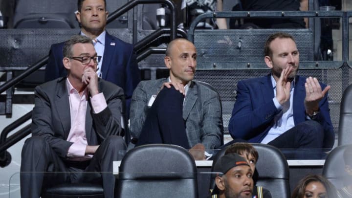 SAN ANTONIO, TX - MARCH 28: RC Buford, Manu Ginobili, and Sean Marks attend a game between the San Antonio Spurs and Cleveland Cavaliers on March 28, 2018 at the AT&T Center in San Antonio, Texas. NOTE TO USER: User expressly acknowledges and agrees that, by downloading and or using this photograph, user is consenting to the terms and conditions of the Getty Images License Agreement. Mandatory Copyright Notice: Copyright 2018 NBAE (Photos by Mark Sobhani/NBAE via Getty Images)