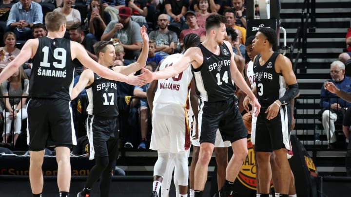SALT LAKE CITY, UT – JULY 1: Luka Samanic #19 and Drew Eubanks #14 of the San Antonio Spurs high five during the game against the Cleveland Cavaliers (Photo by Melissa Majchrzak/NBAE via Getty Images)