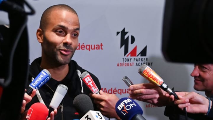 French basketball player Tony Parker speaks with journalists during the inauguration of the "Tony Parker Adéquat Académie" in Lyon, south-eastern France on October 3, 2019. - After taking over the reins of the Asvel basketball club, Tony Parker is continuing his expansion in Lyon with the opening of an academy whose stated ambition is to guarantee a job, sporting or not, for each of its residents. (Photo by PHILIPPE DESMAZES / AFP) (Photo by PHILIPPE DESMAZES/AFP via Getty Images)