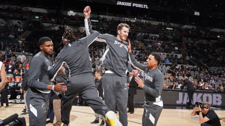 SAN ANTONIO, TX - DECEMBER 3: Jakob Poeltl #25 of the San Antonio Spurs gets hype for the game against the Houston Rockets on December 3, 2019 at the AT&T Center in San Antonio, Texas. NOTE TO USER: User expressly acknowledges and agrees that, by downloading and or using this photograph, user is consenting to the terms and conditions of the Getty Images License Agreement. Mandatory Copyright Notice: Copyright 2019 NBAE (Photos by Darren Carroll/NBAE via Getty Images)