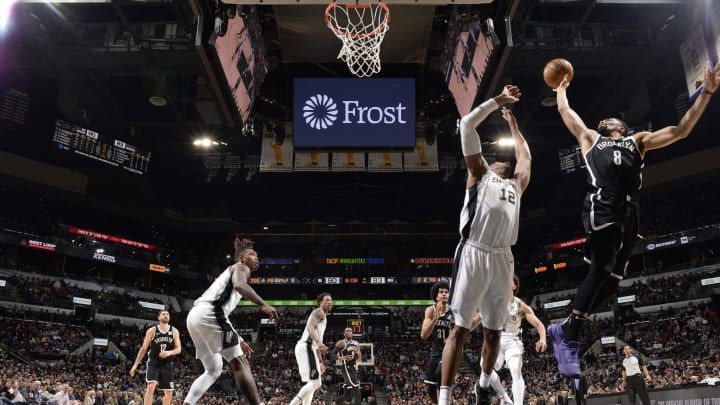 Spencer Dinwiddie of the Brooklyn Nets shoots the ball against the San Antonio Spurs. (Photos by Logan Riely/NBAE via Getty Images)