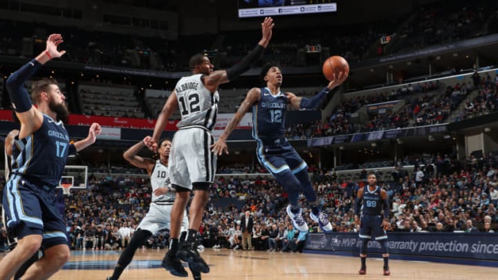 MEMPHIS, TN - DECEMBER 23: Ja Morant #12 of the Memphis Grizzlies shoots the ball against the San Antonio Spurs on December 23, 2019 at FedExForum in Memphis, Tennessee. NOTE TO USER: User expressly acknowledges and agrees that, by downloading and or using this photograph, User is consenting to the terms and conditions of the Getty Images License Agreement. Mandatory Copyright Notice: Copyright 2019 NBAE (Photo by Joe Murphy/NBAE via Getty Images) MEMPHIS, TN - DECEMBER 23: Ja Morant #12 of the Memphis Grizzlies shoots the ball against the San Antonio Spurs on December 23, 2019 at FedExForum in Memphis, Tennessee. NOTE TO USER: User expressly acknowledges and agrees that, by downloading and or using this photograph, User is consenting to the terms and conditions of the Getty Images License Agreement. Mandatory Copyright Notice: Copyright 2019 NBAE (Photo by Joe Murphy/NBAE via Getty Images)