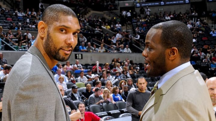 SAN ANTONIO, TX - MARCH 25: Tim Duncan #21 of the San Antonio Spurs, left, speaks to former teammate Malik Rose before a game against the Philadelphia 76ers at the AT&T Center on March 25, 2012 in San Antonio, Texas. NOTE TO USER: User expressly acknowledges and agrees that, by downloading and or using this photograph, user is consenting to the terms and conditions of the Getty Images License Agreement. Mandatory Copyright Notice: Copyright 2012 NBAE (Photos by D. Clarke Evans/NBAE via Getty Images) SAN ANTONIO, TX - MARCH 25: Tim Duncan #21 of the San Antonio Spurs, left, speaks to former teammate Malik Rose before a game against the Philadelphia 76ers at the AT&T Center on March 25, 2012 in San Antonio, Texas. NOTE TO USER: User expressly acknowledges and agrees that, by downloading and or using this photograph, user is consenting to the terms and conditions of the Getty Images License Agreement. Mandatory Copyright Notice: Copyright 2012 NBAE (Photos by D. Clarke Evans/NBAE via Getty Images)