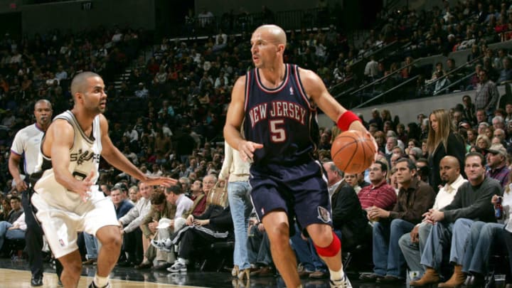 SAN ANTONIO - JANUARY 10: Jason Kidd #5 of the New Jersey Nets looks to drive against Tony Parker #9 of the San Antonio Spurs on January 10, 2006 at the SBC Center in San Antonio, Texas. NOTE TO USER: User expressly acknowledges and agrees that, by downloading and or using this photograph, User is consenting to the terms and conditions of the Getty Images License Agreement. Mandatory Copyright Notice: Copyright 2006 NBAE (Photo by Chris Birck/NBAE via Getty Images)