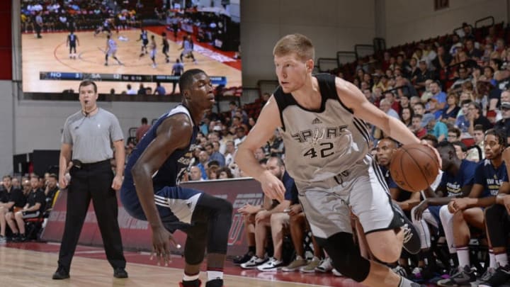 LAS VEGAS, NV - JULY 13: Davis Bertans #42 of the San Antonio Spurs drives to the basket against the New Orleans Pelicans during the 2017 Las Vegas Summer League game on July 13, 2017 at the Cox Pavillion in Las Vegas, Nevada. NOTE TO USER: User expressly acknowledges and agrees that, by downloading and or using this Photograph, user is consenting to the terms and conditions of the Getty Images License Agreement. Mandatory Copyright Notice: Copyright 2017 NBAE (Photo by David Dow/NBAE via Getty Images)