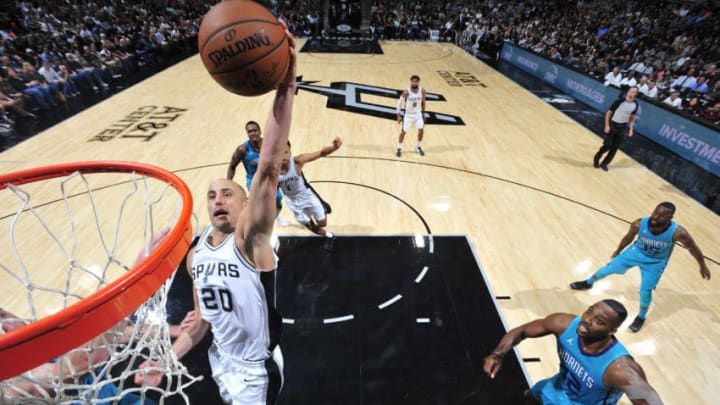 SAN ANTONIO, TX - NOVEMBER 3: Manu Ginobili #20 of the San Antonio Spurs dunks against the Charlotte Hornets on November 3, 2017 at the AT&T Center in San Antonio, Texas. NOTE TO USER: User expressly acknowledges and agrees that, by downloading and or using this photograph, user is consenting to the terms and conditions of the Getty Images License Agreement. Mandatory Copyright Notice: Copyright 2017 NBAE (Photos by Mark Sobhani/NBAE via Getty Images)