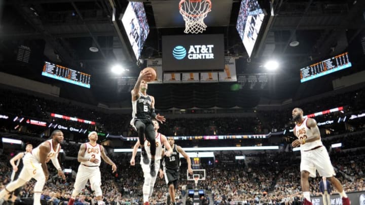 SAN ANTONIO, TX - JANUARY 23: Dejounte Murray SAN ANTONIO, TX - JANUARY 23: Dejounte Murray