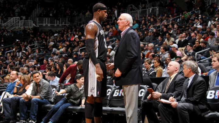 BROOKLYN, NY - FEBRUARY 10: Head Coach Gregg Popovich of the San Antonio Spurs instructs Stephen Jackson
