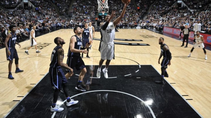 SAN ANTONIO, TX - MARCH 13: LaMarcus Aldridge #12 of the San Antonio Spurs drives to the basket during the game against the Orlando Magic on March 13, 2018 at the AT&T Center in San Antonio, Texas. NOTE TO USER: User expressly acknowledges and agrees that, by downloading and or using this photograph, user is consenting to the terms and conditions of the Getty Images License Agreement. Mandatory Copyright Notice: Copyright 2018 NBAE (Photos by Mark Sobhani/NBAE via Getty Images)