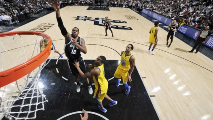 SAN ANTONIO, TX - MARCH 19: LaMarcus Aldridge #12 of the San Antonio Spurs shoots the ball against the Golden State Warriors on March 19, 2018 at the AT&T Center in San Antonio, Texas. NOTE TO USER: User expressly acknowledges and agrees that, by downloading and or using this photograph, user is consenting to the terms and conditions of the Getty Images License Agreement. Mandatory Copyright Notice: Copyright 2018 NBAE (Photos by Mark Sobhani/NBAE via Getty Images)