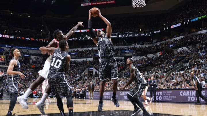 SAN ANTONIO, TX - NOVEMBER 10: Lamarcus Alrdridge #12 of the San Antonio Spurs handles the ball against the Houston Rockets on November 10, 2018 at AT&T Center in San Antonio, Texas. NOTE TO USER: User expressly acknowledges and agrees that, by downloading and or using this photograph, user is consenting to the terms and conditions of Getty Images License Agreement. Mandatory Copyright Notice: Copyright 2018 NBAE (Photo by Mark Sobhani/NBAE via Getty Images)