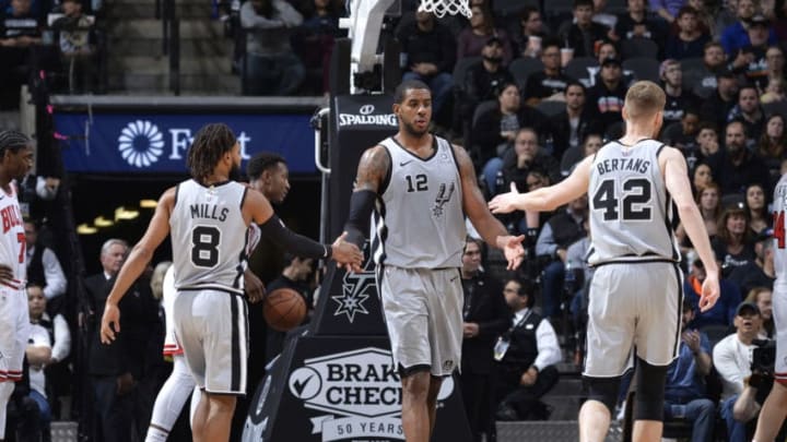 SAN ANTONIO, TX - DECEMBER 15: LaMarcus Aldridge #12 of the San Antonio Spurs hi-fives teammates during the game against the Chicago Bulls on December 15, 2018 at the AT&T Center in San Antonio, Texas. NOTE TO USER: User expressly acknowledges and agrees that, by downloading and or using this photograph, user is consenting to the terms and conditions of the Getty Images License Agreement. Mandatory Copyright Notice: Copyright 2018 NBAE (Photos by Mark Sobhani/NBAE via Getty Images)
