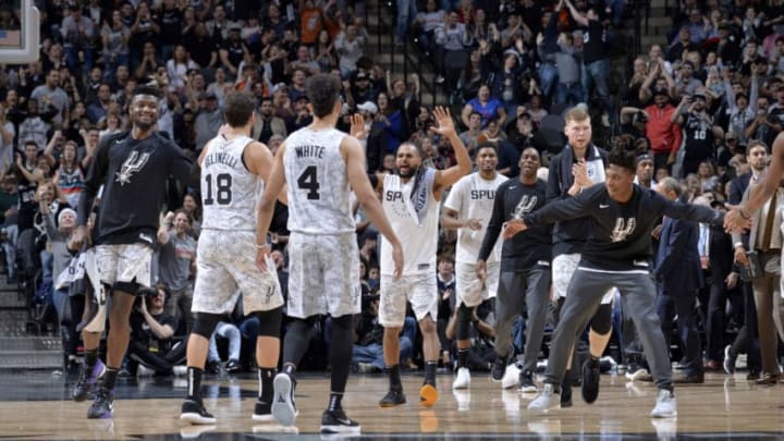 SAN ANTONIO, TX - DECEMBER 26: The San Antonio Spurs celebrate during the game against the Denver Nuggets on December 26, 2018 at the AT&T Center in San Antonio, Texas. NOTE TO USER: User expressly acknowledges and agrees that, by downloading and/or using this photograph, user is consenting to the terms and conditions of the Getty Images License Agreement. Mandatory Copyright Notice: Copyright 2018 NBAE (Photo by Mark Sobhani/NBAE via Getty Images)