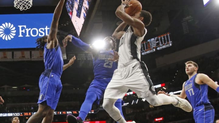 SAN ANTONIO,TX - OCTOBER 29: DeMar DeRozan #10 of the San Antonio Spurs scores past Dallas Mavericks at AT&T Center on October 29 , 2018 in San Antonio, Texas. NOTE TO USER: User expressly acknowledges and agrees that , by downloading and or using this photograph, User is consenting to the terms and conditions of the Getty Images License Agreement. (Photo by Ronald Cortes/Getty Images)