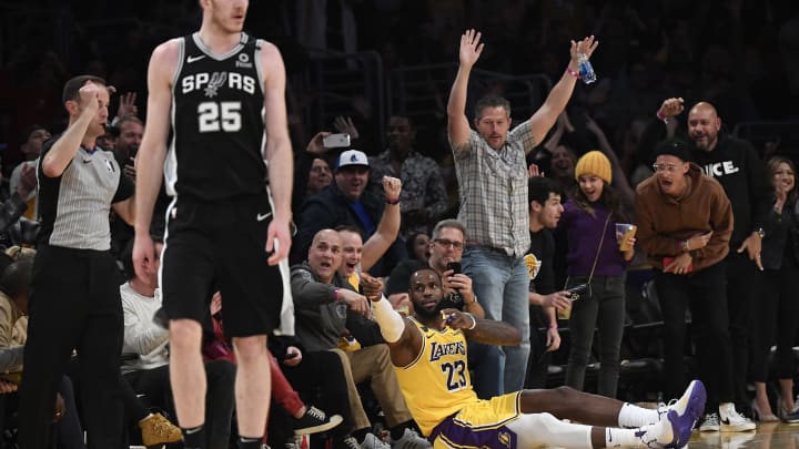 LOS ANGELES, CA – FEBRUARY 04: LeBron James #23 of the Los Angeles Lakers wants a foul call on Jakob Poeltl #25 of the San Antonio Spurs after making a basket versus the San Antonio Spurs. (Photo by Kevork Djansezian/Getty Images)