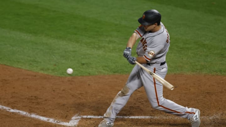 Alex Dickerson #12 of the SF Giants bats during the fifth inning against the Colorado Rockies at Coors Field on September 1, 2020. (Photo by Justin Edmonds/Getty Images)