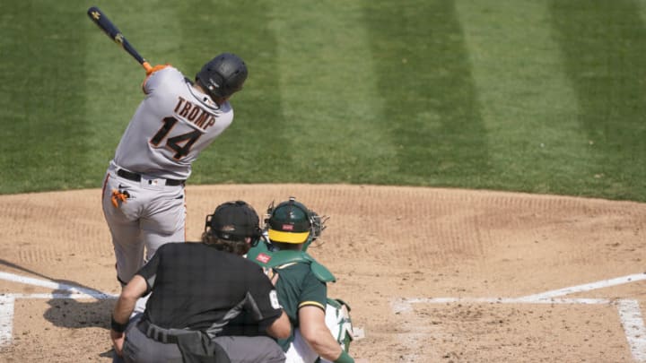 OAKLAND, CALIFORNIA - SEPTEMBER 20: Chadwick Tromp #14 of the SF Giants hits a base hit against the Oakland Athletics in the top of the fifth inning at RingCentral Coliseum on September 20, 2020 in Oakland, California. (Photo by Thearon W. Henderson/Getty Images)