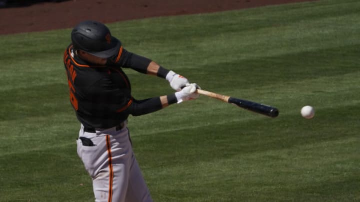 SF Giants infielder Will Wilson (85) hits a three run double against the Los Angeles Angels during a spring training game at Tempe Diablo Stadium. (Rick Scuteri-USA TODAY Sports)