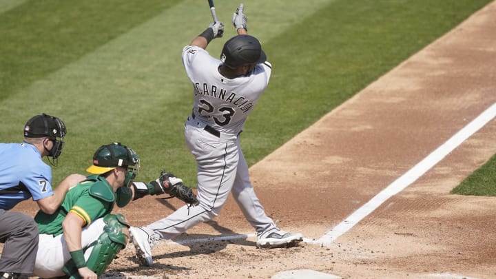OAKLAND, CALIFORNIA – SEPTEMBER 30: Edwin Encarnacion #23 of the Chicago White Sox bats against the Oakland Athletics during the second inning of Game Two of the American League Wild Card Round at RingCentral Coliseum on September 30, 2020 in Oakland, California. (Photo by Thearon W. Henderson/Getty Images)