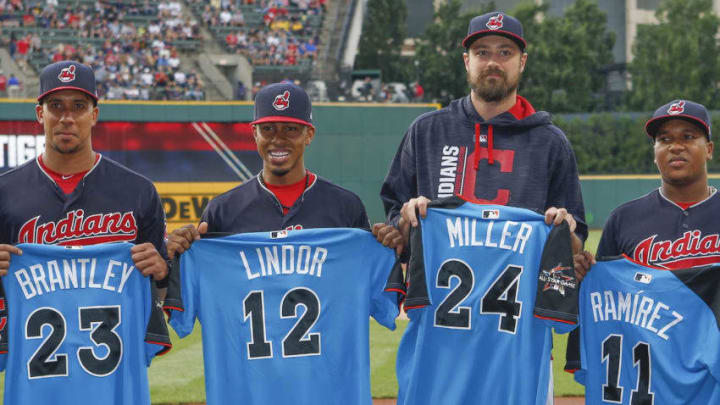 CLEVELAND, OH - JULY 09: Michael Brantley #23, Francisco Lindor #12, Andrew Miller #24 and Jose Ramirez #11 of the Cleveland Indians receive their All Star jerseys before a game against the Detroit Tigers at Progressive Field on July 9, 2017 in Cleveland, Ohio. (Photo by Ron Schwane/Getty Images)