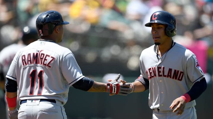 OAKLAND, CA - JULY 16: Francisco Lindor #12 of the Cleveland Indians is congratulated by Jose Ramirez #11 after Linfor scored against the Oakland Athletics in the top of the fouth inning at Oakland Alameda Coliseum on July 16, 2017 in Oakland, California. (Photo by Thearon W. Henderson/Getty Images)