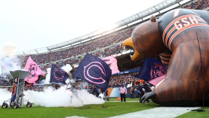 Oct 4, 2015; Chicago, IL, USA; Flags are brought out from the tunnel prior to player introductions for the game between the Chicago Bears and the Oakland Raiders at Soldier Field. Mandatory Credit: Jerry Lai-USA TODAY Sports